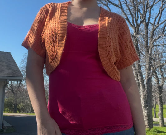 Knit minded orange shrug sweater