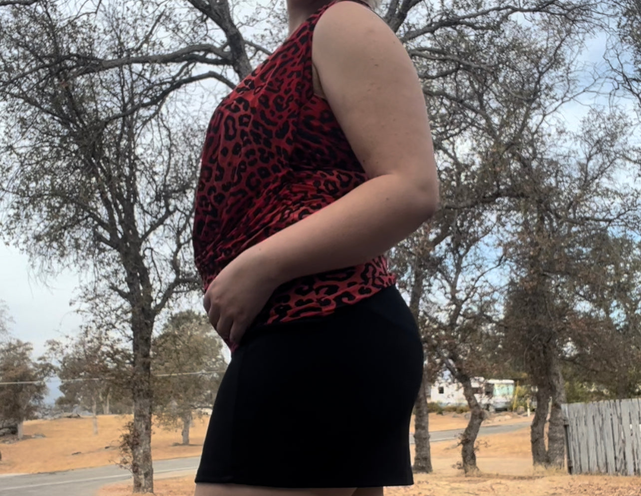 Maggie early 2000s y2k leopard going out top