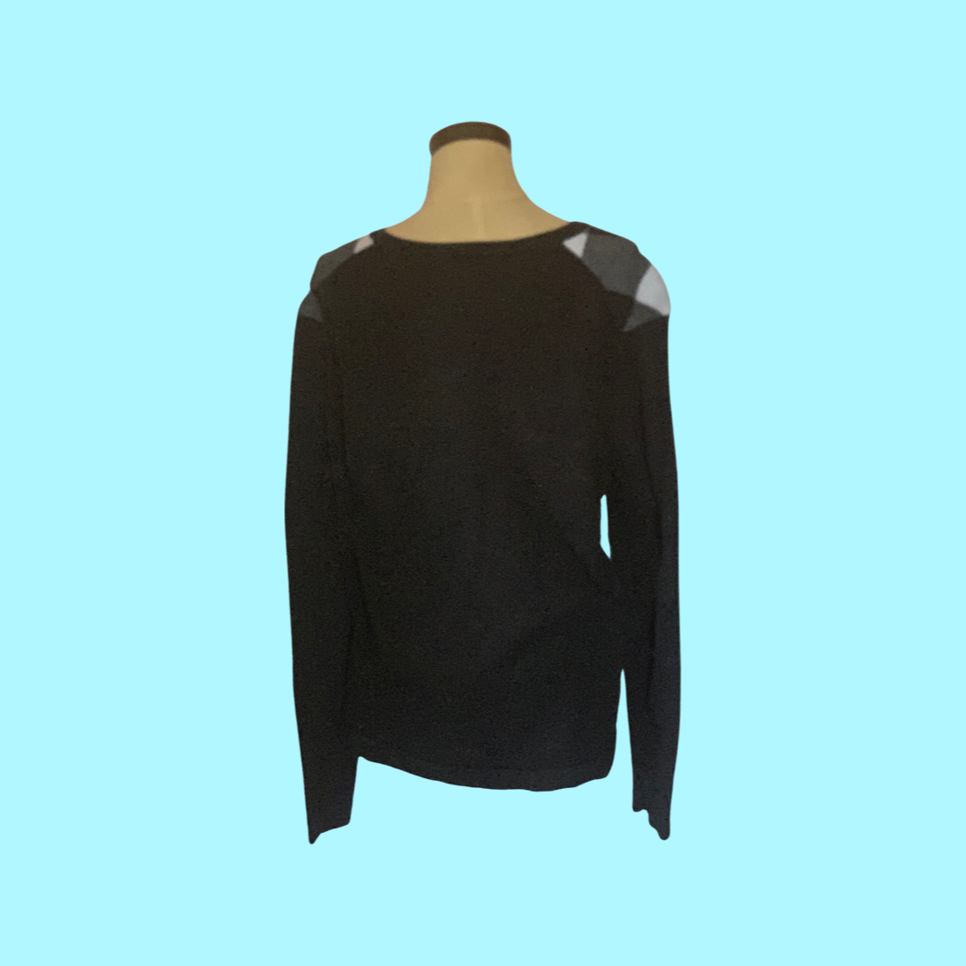 H and M argyle black and white sweater size medium