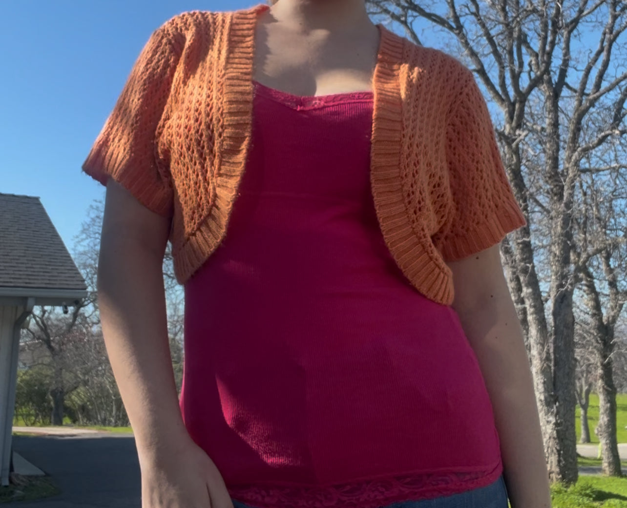 Knit minded orange shrug sweater